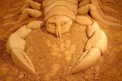 A sand sculpture entitled 'Giant Scorpion' carved by Fergus Mulvany from Ireland is seen at the Creepy Crawlies Sand Sculpting Exhibition on the Frankston waterfront on December 26, 2010 in Melbourne, Australia. International sand sculpture artists from around the world teamed up with their Australian counterparts to create the insect themed exhibition that will be open to the public until April, 2011.