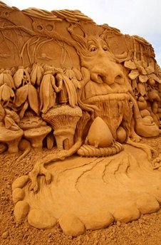 A sand sculpture entitled 'Enchanted Garden' carved by Meg Murray from Australia is seen at the Creepy Crawlies Sand Sculpting Exhibition on the Frankston waterfront on December 26, 2010 in Melbourne, Australia. International sand sculpture artists from around the world teamed up with their Australian counterparts to create the insect themed exhibition that will be open to the public until April, 2011.