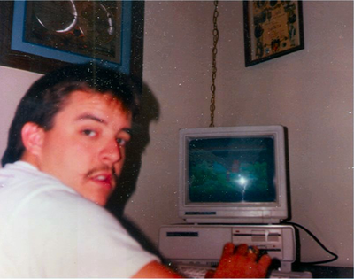 My friend Mike, playing Hero's Quest/Quest for Glory on my snazzy Tandy 1000SX...