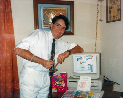 Me, dressed like Leisure Suit Larry, in front of my Tandy 1000X... that photo would later be used for a contest in Sierra's InterAction Magazine.