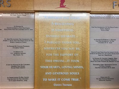 This is an area on the only remaining original wall of the hospital that features some dedications from donors and a central display with a quote from St. Jude founder Danny Thomas.